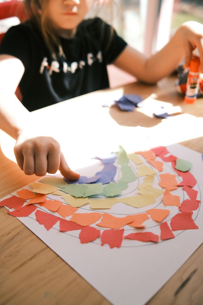 A student working on a hands-on craft project